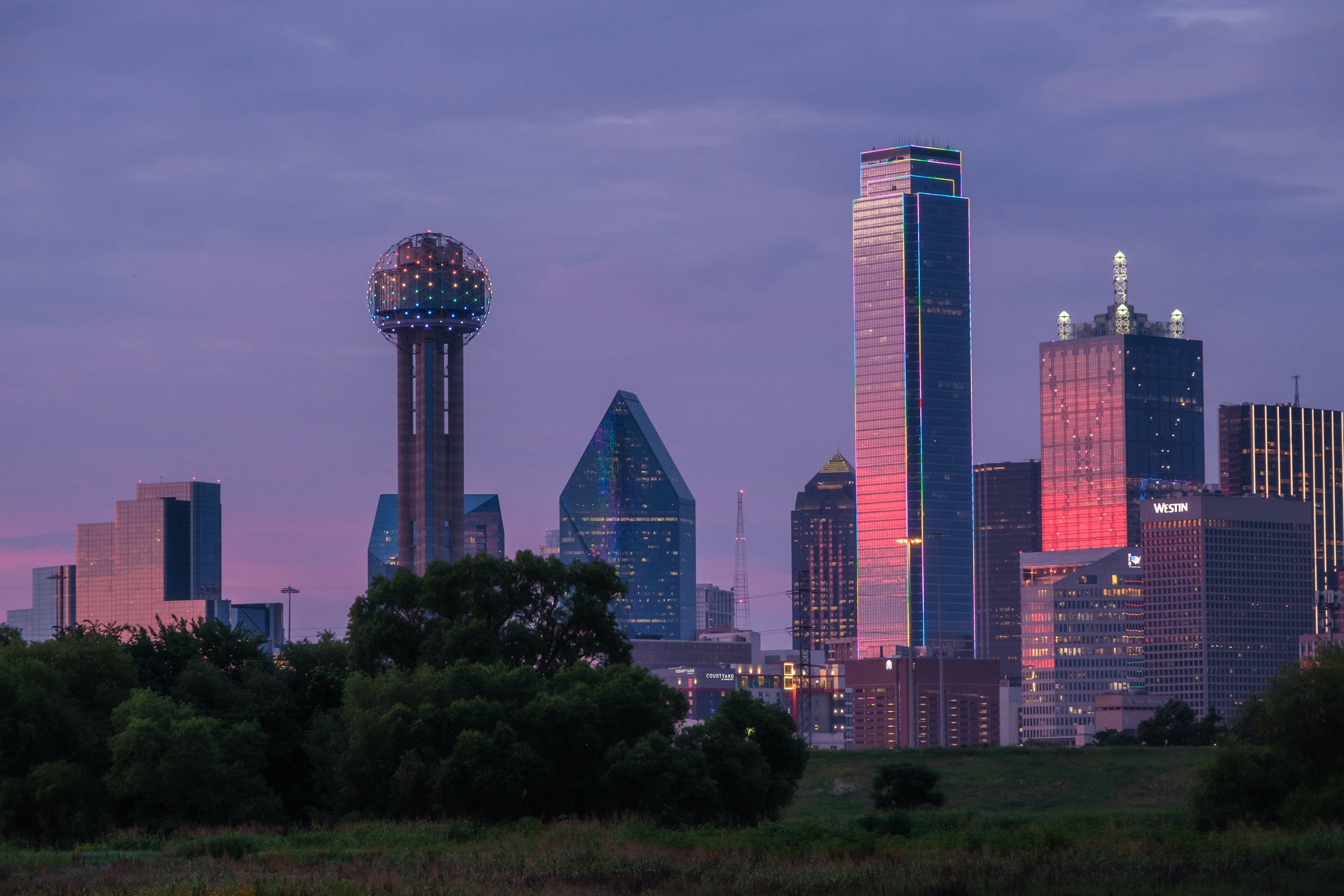 The Dallas skyline and Margaret Hunt Hill Bridge at dusk